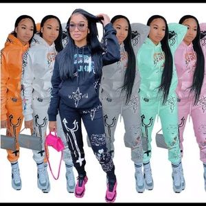 Woman’s graffiti sweatsuits size M,L,XL,XXL
